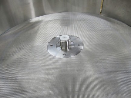 Spheronizer disc installed in drum